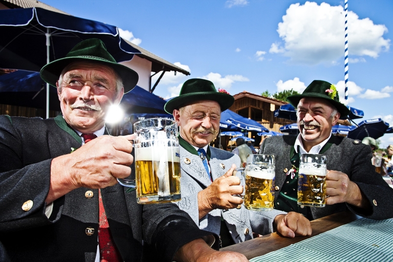 Three men in beergarden Munich