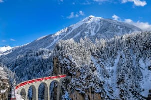 winter_travel_itinerary_-_glacier_express_running_into_the_tunnel_in_switzerland
